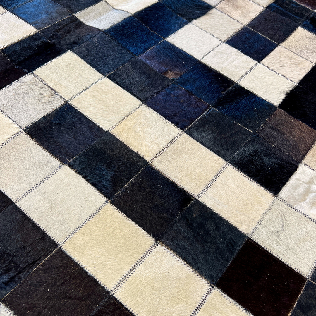 One of A Kind - Labyrinth Black and White Patchwork Cowhide Area Rug